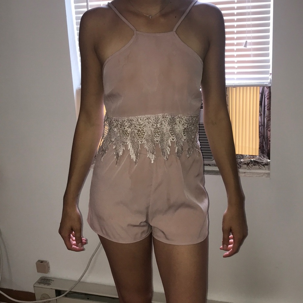Romper- stains on the front and back bottoms